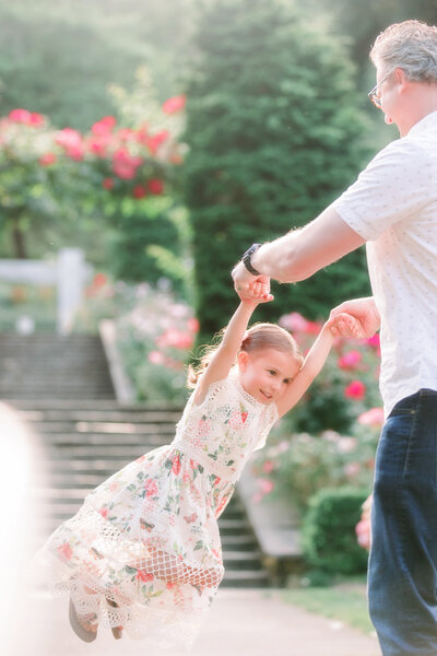 Father daughter photoshoot in rose garden