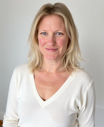 Becca Maniar headshot against a white background for Supported Awakening spiritual energy activation website