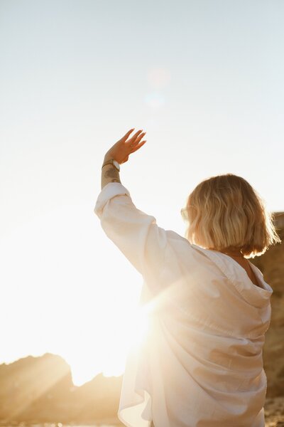 a woman celebrating newfound freedom after a therapy intensive in Santa Monica