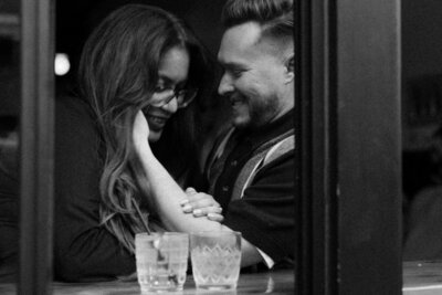 photo of man and woman smiling at each other taken by NYC elopement photographer