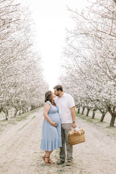 Fresno maternity photographer capturing sweet moments between couple before baby arrives