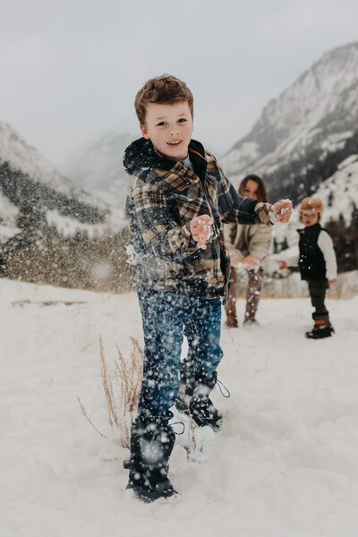 Family poses in wildflowers in Ouray, Colorado.