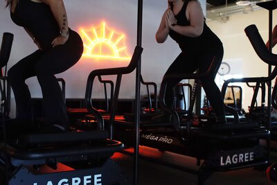 What to bring to your first Lagree fitness class—shoes, water, yoga mat, and gym bag setup at Rise Studio