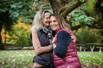 A couple smiling and holding each other