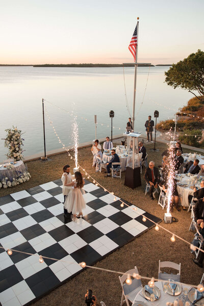 overhead view of checkered dance floor and reception by wedding planner tampa