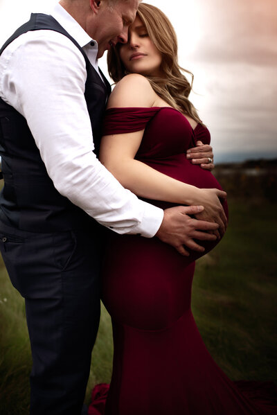 Lansing Maternity Photography couples looking at each other by For the Love of Photography
