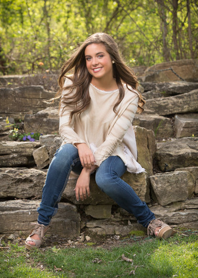 High School Senior Girl Posed for Pictures