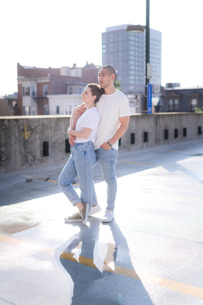 father tossing daughter into the air