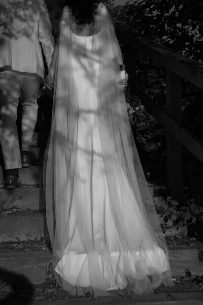 bride and groom walking along path