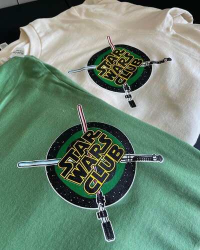 Star Wars Club custom-printed shirts in white and green.