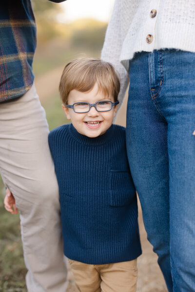 poses for young boys with glasses family photography session