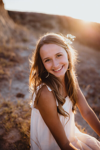 GOLDEN HOUR SENIOR WITH BABIES BREATH IN HAIR