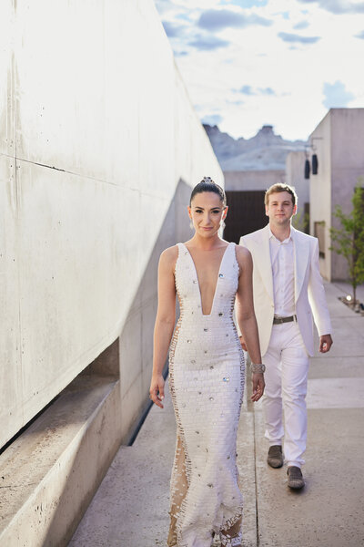 Couple walking at Amangiri Utah before their ultra luxury wedding