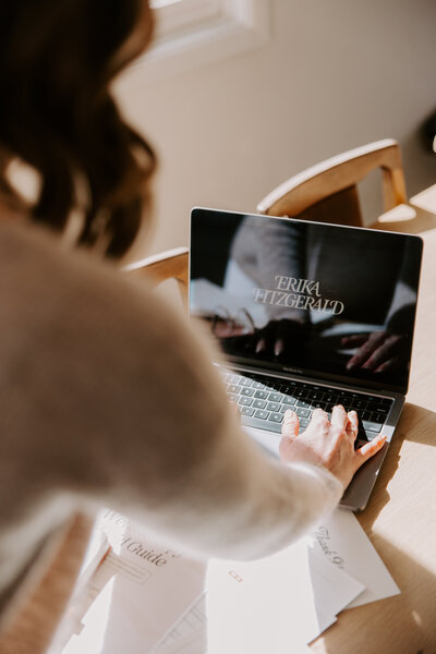 Website copywriter Erika Fitzgerald working on a blog post about website copywriting power words 
