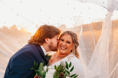 photo of bride and groom admiring their venue