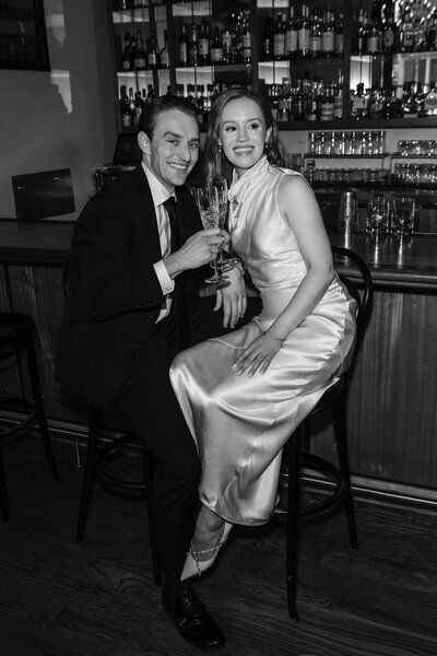 Raleigh bride and groom at bar after wedding