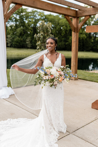 bride holding veil