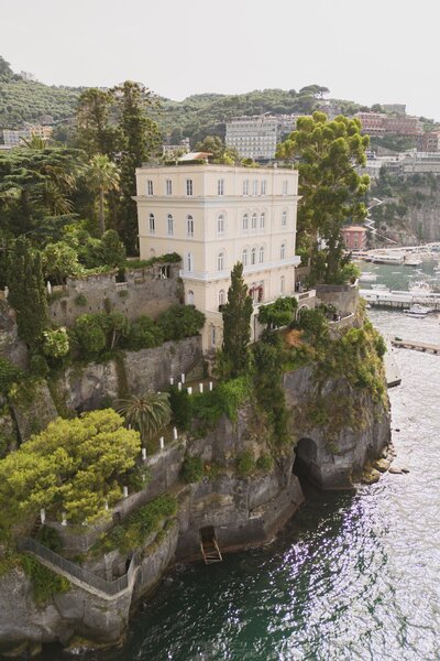 Villa Astor in Sorrento, Italy is a breathtaking luxury wedding and event venue perched on the cliffs overlooking the Mediterranean. With its stunning architecture, lush gardens, and panoramic sea views, Villa Astor offers an unforgettable setting for your special day. Perfect for elegant weddings and high-end events, this historic villa provides a unique and enchanting backdrop in the heart of Italy's Amalfi Coast.