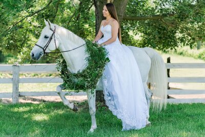 Kelli and horse Lily pose for Charlotte NC wedding photographer for Kelli's post wedding photoshoot