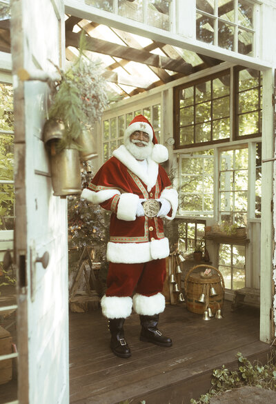 The Black Santa of Atlanta standing in Das Hinterhaus.