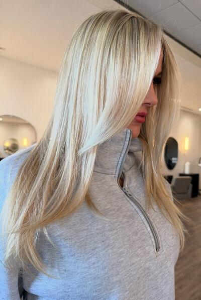 Bright blonde babylight client at NOVA Strands Texas