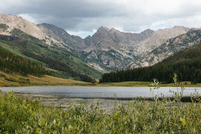 A mountain range with a lake at the base.