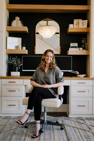 Gillian Sarah smiling in an office