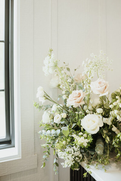 wedding floral display on bar top
