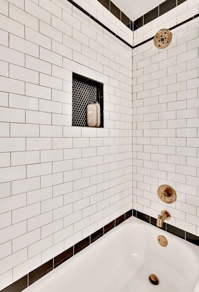 Luxury shower in this one-bedroom, one-bathroom luxury rental condo in the historic Behrens building in downtown Waco within walking distance to the Silos, Baylor, and local museums.