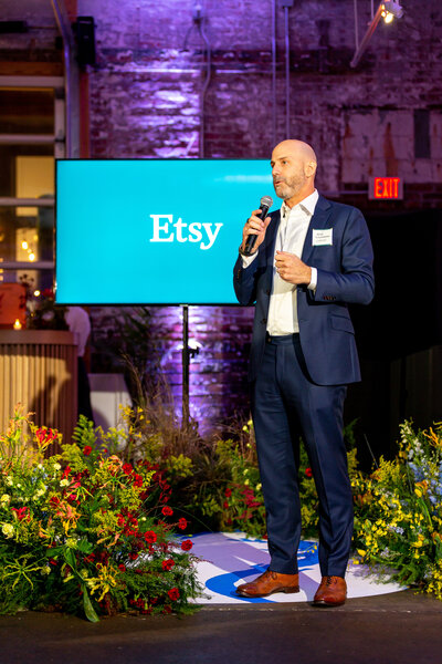 Person presenting on stage