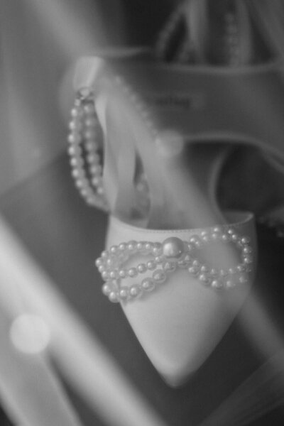 Beaded bows on bridal shoes