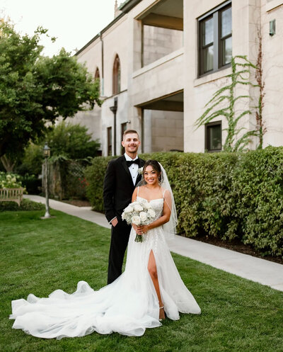 Bride and groom outside smiling