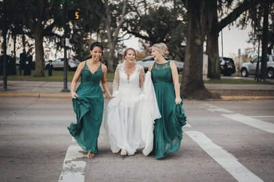 Bride with bridesmaids in green dresses