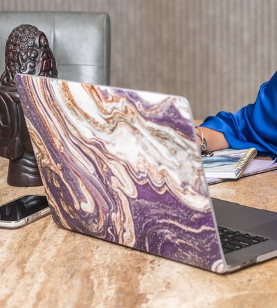 purple marble cover on a laptop