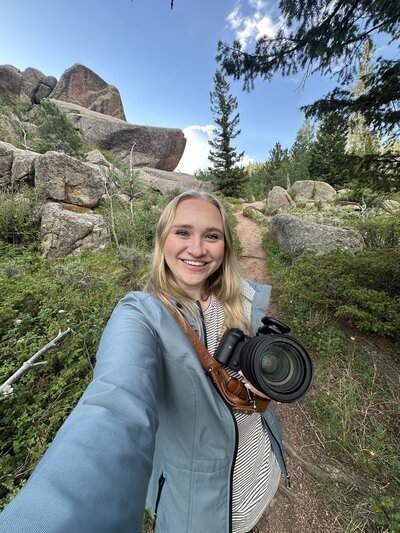 Jessica Nicole Photography posing during a session at Vedauwoo near Laramie, Wyoming.