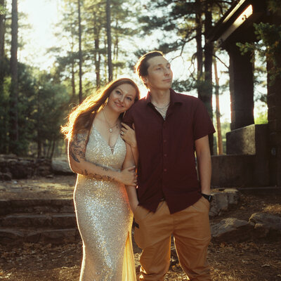 A couple holding one another on 35mm film