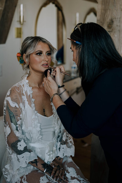 Classic soft glam bridal makeup featuring glowing skin, full lashes, and soft contour — created by Klover Beauty for a timeless Maryland wedding.