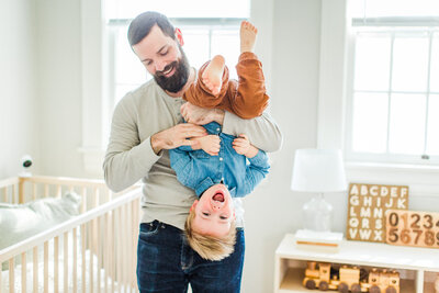 father and son playing