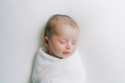 Richmond Family Photographer | Photo of a sleeping, naturally-posed newborn baby girl by Jacqueline Aimee Portraits