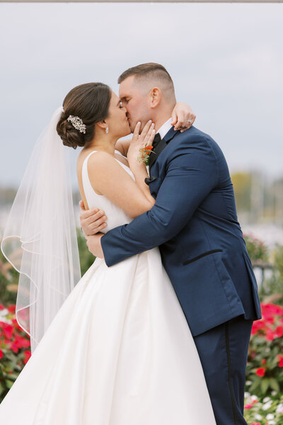 Bride and groom in wedding attire for mid-luxury wedding