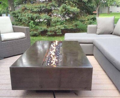 Steel-look concrete fire pit and  table with electric start .