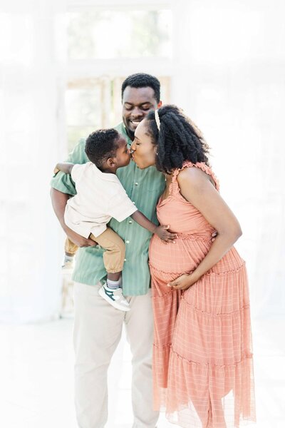 family embraces during houston family photo session