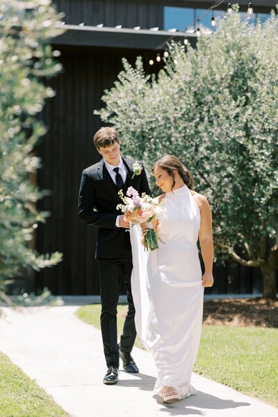bride and groom walking together on their wedding day