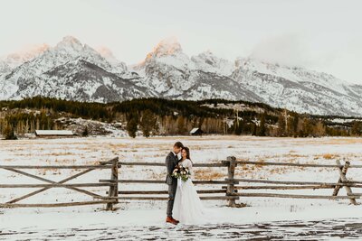 A bride and groom celebrating their marriage at their wedding in Jackson Hole, Wyoming