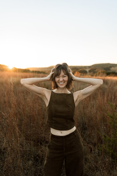 Little girl splashing water at the beach