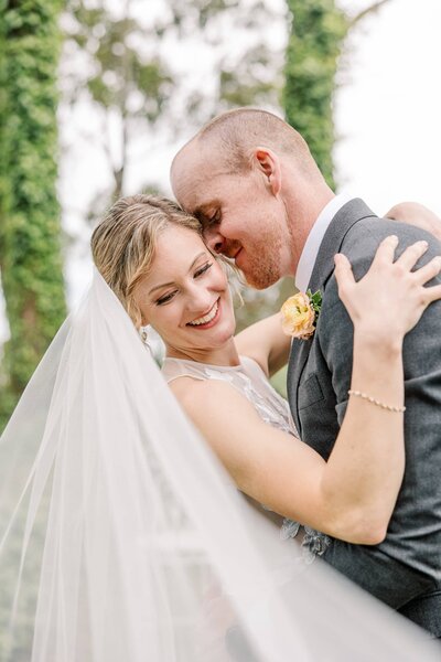 Groom kissing bride