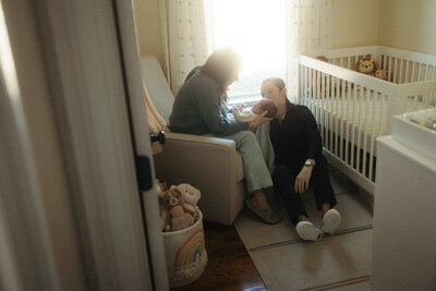 Newborn photography session in the baby's nursery
