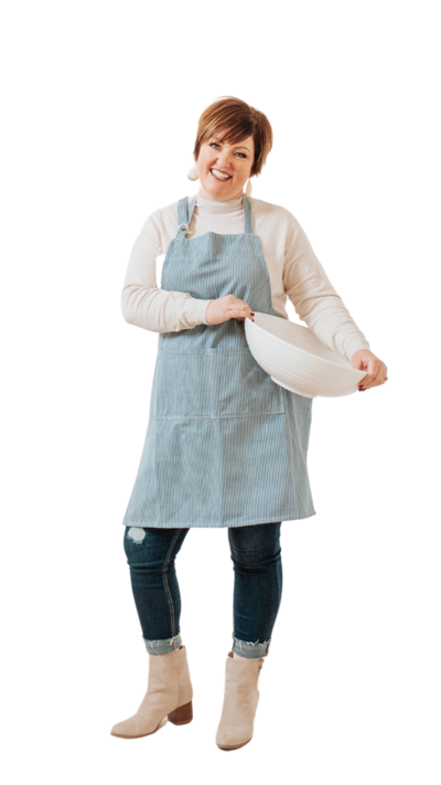 Mama Lisa in one of her favorite aprons.  Doing her favorite thing, baking