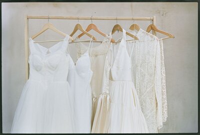 Editorial bridal portraits running through Arizona desert in wedding dress and boots | Artful portraits by Arizona luxury wedding photographer Tess Gearhart