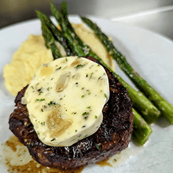 Filet Mignon with Garlic Compound Butter Max Dales Steak and Chop House Restaurant serving Mount Vernon and Burlington